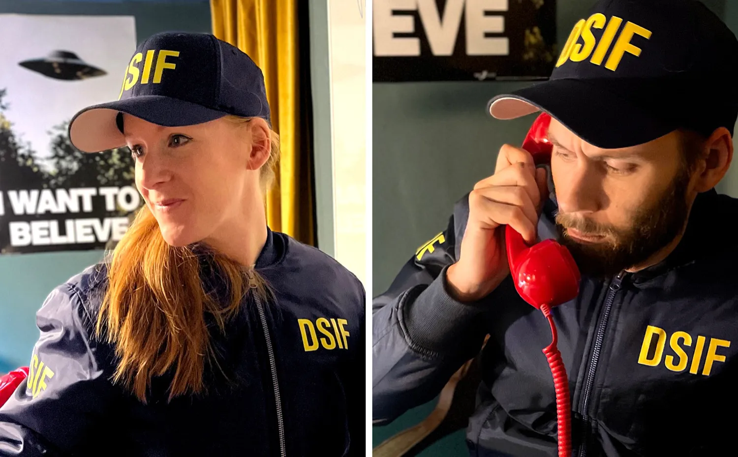 Två personer i marinblå DSIF-jackor och kepsar framför en affisch med texten I want to believe